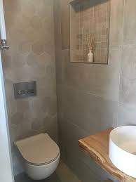 oplevering van sanisale com spijkenisse prachtige hexagon tegels gecombineerd met een mat witte fla toilet ontwerp zeshoekige tegel badkamer toilet verbouwing