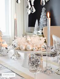 Crisp Whites And Cool Metallics Are Layered Together For A Fresh Winter Wonderland I Christmas Dining Table Silver Christmas Decorations Christmas Centerpieces