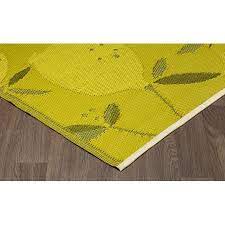 They are made in materials that can withstand wear and tear from rain, snow and an outdoor carpet is normally made of densely flatwoven polypropylene, sometimes with mixed in synthetic latex. 6 X 9 Yellow Lemon Reversible Indoor Outdoor Plastic Rug Walmart Canada