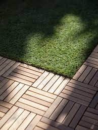 These 9 creative outdoor patio flooring ideas can be done without a contractor, and can be done in weekend. Wood Deck Tiles Over Grass Wood Deck Tiles Deck Tiles Over Grass Outdoor Deck Tiles