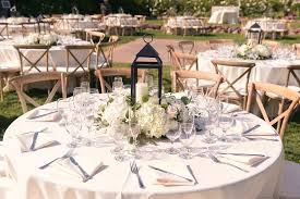 Wedding Reception 60 Round Dinning Tables With Natural Wood Vineyard Chairs Floral Centerpie Round Table Centerpieces Dinning Table Decor Round Dinning Table