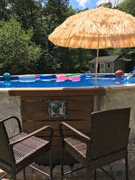 Above ground, pools can look just as elegant and add interest to your landscaping as well. My Pallet Tiki Bar Above Ground Pool Landscaping Pool Landscaping Backyard Pool