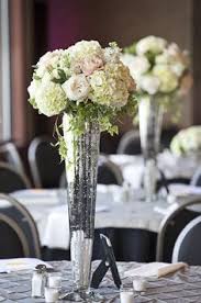 See more ideas about tall centerpieces, centerpieces, wedding centerpieces. 18 Trumpet Vase Centerpiece Styles Ideas Trumpet Vase Centerpiece Wedding Centerpieces Vase Centerpieces