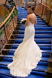 A Disney Cruise Line Bride Displays Her Beautiful Wedding Dress On The Grand Staircase Disney Cruise Wedding Cruise Ship Wedding Disney Wedding