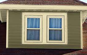 White Replacement Windows And House