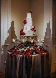 How To Give Your Ballroom Wedding A Chic Fall Style Gold And Burgundy Wedding Wedding Cake Table Wedding Cake Table Decorations
