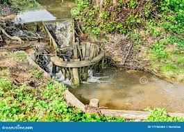 Small Wooden Dam on Mountain River, Forest and Green Grass Stock Photo -  Image of mountain, flow: 77756364
