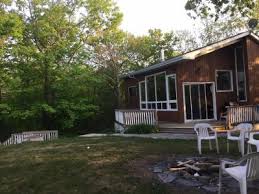 Two people kayaking on sylvan lake. Great Cottages For Rent By Owner Vacation Cottage Rentals Cabins Condos And Chalets For Rent Private Vacation Rentals In Western Canada Including Alberta And Bc