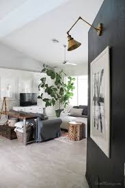 Choose from a range of styles and colors, from mosaic styles to art deco to mason jars. Black Accent Wall Living Room With Diy Black And White Art And Gold Sconces 16 House Mix