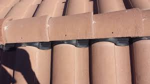 Close Up Of Continuos Ridge Venting On A Tile Roof This Will Help Cool Your Attic And Reduce Your Energy Us Energy Efficient Roofing Roof Cleaning Ridge Tiles