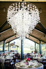Take down your old ugly chandelier and remove globes, wipe off really good. 26 Must See Wedding Chandeliers You Could Totally Diy With A Hula Hoop