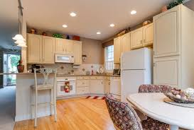 A pro then applies a new coat of paint or stain. Brush Roll Painting Cabinet Woodwork Refinishing In Omaha Ne