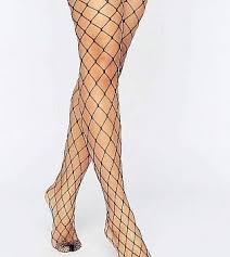 Fairy grunge aesthetic setting the world of fashion on fire! How To Wear Fishnets For A Bold And Chic Look The Trend Spotter