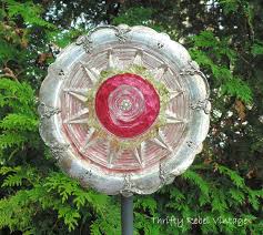 There are many ways to decorate a garden. How To Make A Garden Art Dish Flower Color Me Thrifty