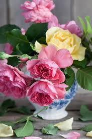 Our bouquets come in an array of pretty pastel colors: Vase Pink Yellow Flowers Roses Book Scissors 750x1334 Iphone 8 7 6 6s Wallpaper Background Picture Image