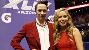 Johnny Weir, Tara Lipinski Cause Stir in Can’t-Miss Matching Silver Fits at Olympics