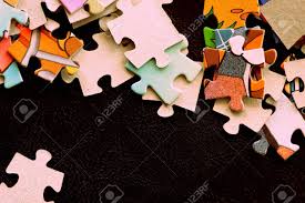 They feature fun puzzles of all types that'll keep you entertained. Children S Puzzles On A Dark Surface Close Up Brown Color Toned Stock Photo Picture And Royalty Free Image Image 128429032