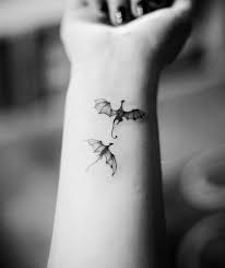 Two Dragons Flying Small Wrist Tattoo Dragon Tattoo Design Black White Photo Dragon Tattoo Dragon Tattoo Designs For Women Dragon Tattoo Designs