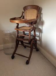 Antique High Chair Converts To A Rocking Chair Was Originally Used By My Husband S Grandmother Back In Early 1900 S But It May Be Schommelstoel Hobbelpaarden