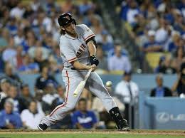 Los Angeles Ca September 23 Starting Pitcher Madison Bumgarner 40 Of The San Francisco Giants Hits A Two Run Giants Team San Francisco Giants Team Photos