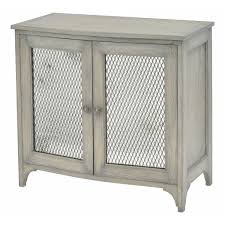 Strong welded construction with mesh door panels for visibility and ventilation whist maintaining security. Fairmont Mindi Wood Small Storage Cabinet With Mesh Doors