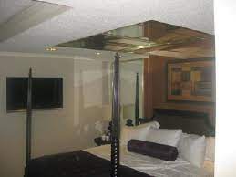 Black bedside tables with mirror finish give the room a modern touch but overall the style is quite traditional. Pin On Dream House