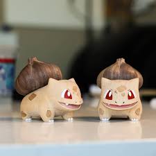 The Craftsmanship Of These Bulbasaur Wood Carvings Is Incredible Wooden Pokemon Art Love Painting Pokemon Craft Carving