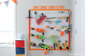This diy project is such a great playroom idea. Diy Nerf Gun Storage Inspiration Made Simple