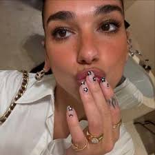 Dua Lipa's Chunky Engagement Ring Sparks a New Trend in Bridal Jewelry