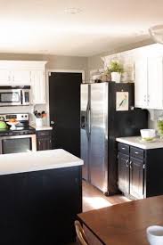 Just make sure there is plenty of natural light in the space. Black Bottoms And White Tops Kitchens With Contrast Kitchen Facelift Kitchen Design Home Kitchens