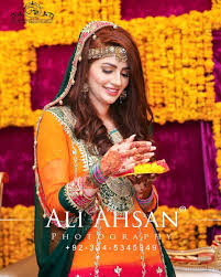 This Dress Is Wore By Brides From Pakistan And India Mostly On Their Mehndi Mayoon Dholki Haldi Ce Pakistani Mehndi Dress Bridal Mehndi Dresses Mehndi Dress