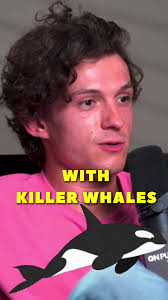 Tom Holland swims with killer whales in Mexico shared