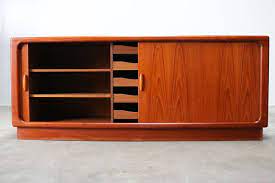 Discover prices, catalogues, and novelties Danische Credenza Aus Teak Mit Rollturen Von Dyrlund 1950er Bei Pamono Kaufen
