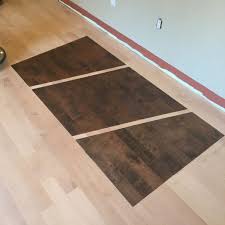 Stain Samples On Birch Hardwood Floor The Best Way To Decide On A New Colour For Your Floor Is To See It On Yo Birch Hardwood Floors Birch Floors Staining Wood