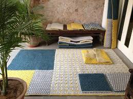 wool woven on plastic lattice creates a hand stitched look fabric rug plastic lattice rugs