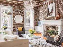 We found a cool antique console that we placed behind the sofa to really set the tone. Living Rooms This Old House