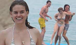 Alice Eve parades her curves in nautical striped string bikini on Barbados  beach break | Daily Mail Online