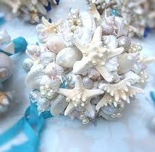 Beach wedding bouquet diy featuring shell accents and beautiful artificial flowers from afloral.com. 20 Beach Wedding Bouquet Ideas Seashells And Flowers