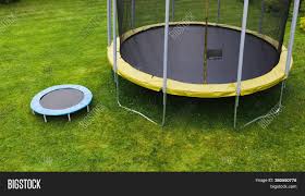 Clothes size comparison charts & tables metric conversion calculators & tables temperature conversions, weight conversions, length conversions. Small Trampoline Near Image Photo Free Trial Bigstock