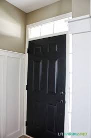 Black door looks great with black accents. Black Front Door Life On Virginia Street