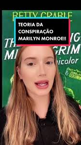 Marilyn Monroe y Charlton Heston en los Globos de Oro 1962