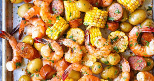 Combine the salt, coriander seeds, fennel seeds, peppercorns, bay leaves, red pepper flakes, thyme, onions, celery, tomatoes, lemons and garlic in a large deep pot; Sheet Pan Shrimp Boil Damn Delicious