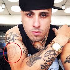 Nick rivera caminero (born march 17, 1981), known professionally as nicky jam, is an american singer, songwriter, rapper, and actor of the genres latin trap and reggaeton. Nicky Jam S 29 Tattoos Their Meanings Body Art Guru
