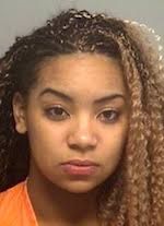 Woman charged in crash that killed pedestrian, passenger