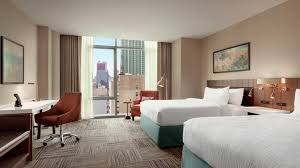 Deep seating chair + settee + side table + coffee table. Hilton Garden Inn Chicago Downtown South Loop