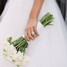 Be sure to stick to hardier flowers like roses, which are easier to arrange and can endure a little manhandling. These Long Stemmed Bouquets Give An Effortlessly Romantic Feel