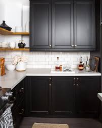 If you need a little assistance embracing your dark side, read on. Modern Kitchen With Black Cabinets And Open Shelving Home Kitchens Black Kitchen Cabinets New Kitchen Cabinets