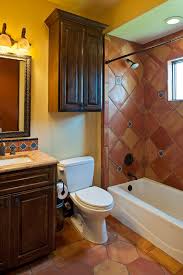 Many bathrooms in mexican style houses use saltillo tiles and create a tile rug. Small Dark Bathroom Tiles Novocom Top