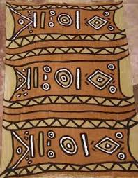Strips Are Sewn Into Large Panels Fabric Panels Are Dyed By Soaking In Decoctions Of Leaves And Bar African Pattern Design African Mud Cloth African Pattern