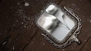 A being walked through one. Broken Mirror Superstition How To Avoid 7 Years Of Bad Luck